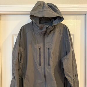 Mens KUHL windbreaker/weather resistant zippered jacket with hood.
